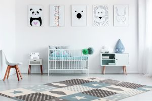 Boy's,Bed,Between,White,Cabinet,And,Violet,Tear,Pillow,On