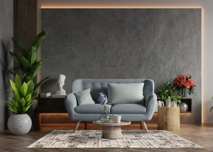 Living room loft in industrial style with blue sofa on empty con