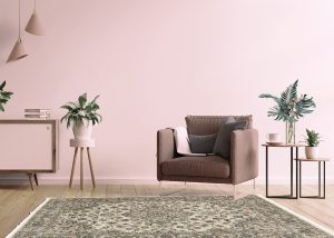 Modern minimalist interior with an armchair on empty white wall