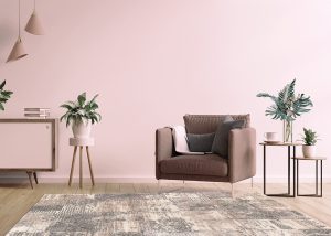 Modern minimalist interior with an armchair on empty white wall