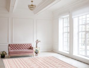 Luxury rich living room interior design with elegant classic furniture and wall decorations. Large light white room with big window